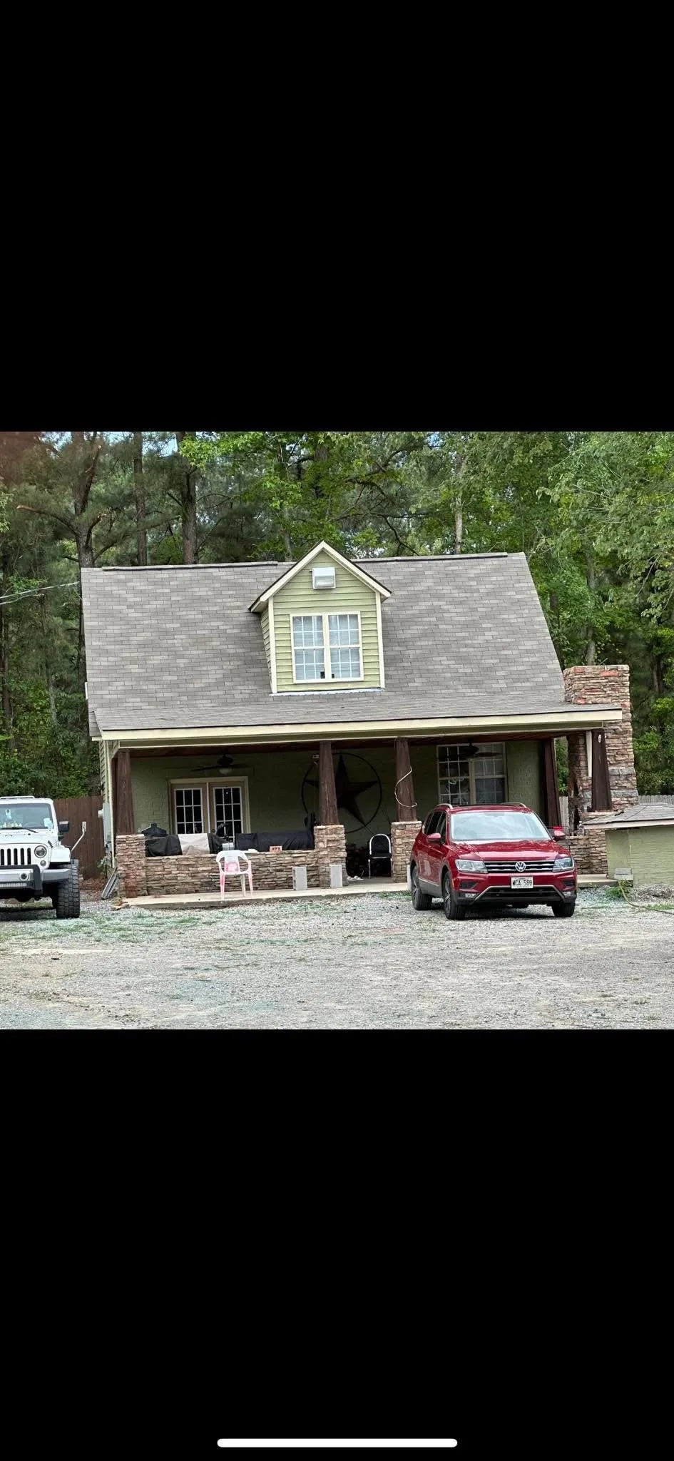Finished custom craftsman home with covered porch built by 3-G Custom Homes