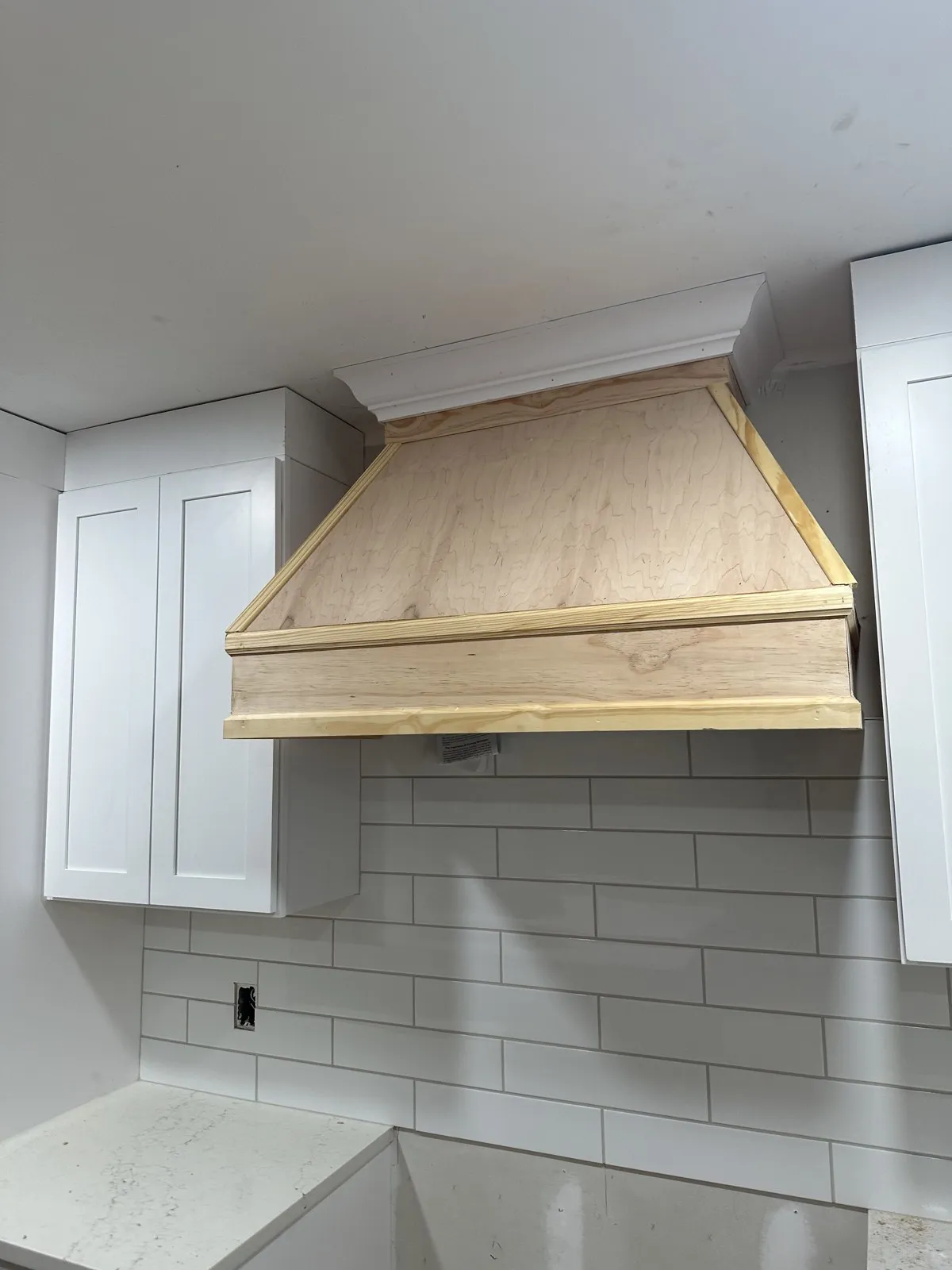 Custom wood range hood detail