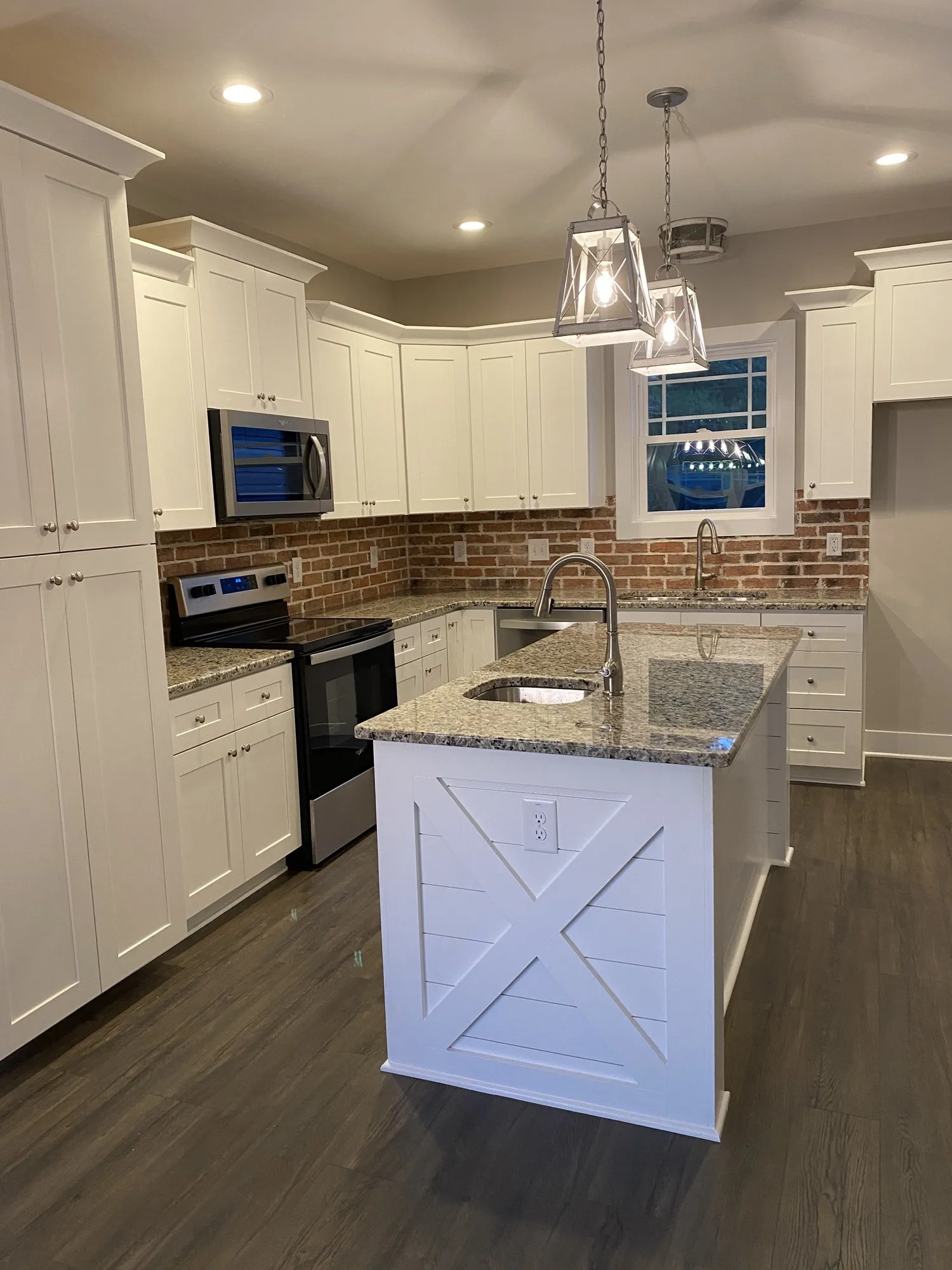 Custom kitchen with island and pendant lighting